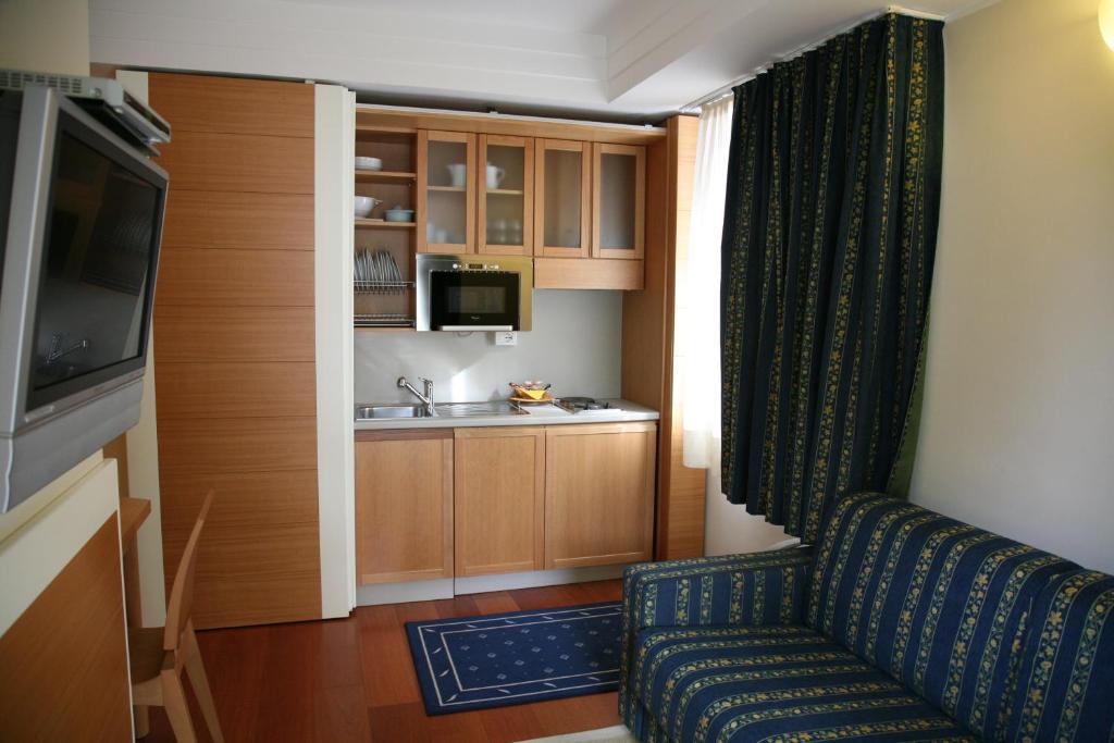 Aparthotel England リッチョーネ 部屋 写真